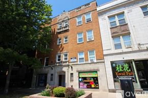 Chicago apartment for rent - A building with a storefront that has a sign that says "Kwai Fah Acupuncture".