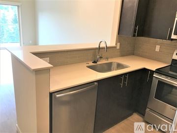 Mercer Island apartment for rent - A kitchen with a sink and a dishwasher.