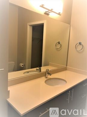 Mercer Island apartment for rent - A bathroom with a sink and mirror.