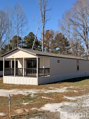 Bells house for rent - A walk-in closet with a shelf and a hanger.