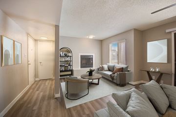 Glendale apartment for rent - A living room with a grey couch and a coffee table.