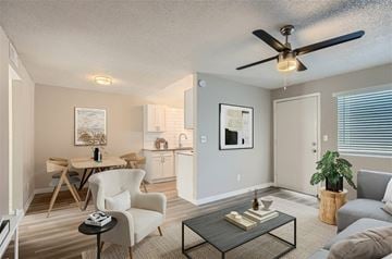Glendale apartment for rent - A living room with a dining table and chairs.