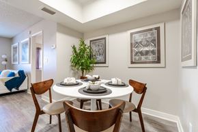 Mesa apartment for rent - A dining room with a white table and chairs.