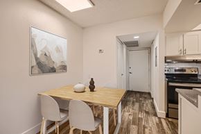 Phoenix apartment for rent - A dining area with a wooden table and chairs.