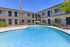 Glendale apartment for rent - A swimming pool in front of apartment buildings.