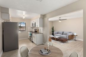 Phoenix apartment for rent - A modern kitchen with a dining table and chairs.