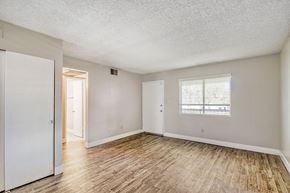 Phoenix apartment for rent - A gym with a treadmill, exercise balls, and weights.