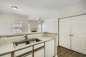 Mesquite apartment for rent - A gym with a variety of equipment including treadmills, weights, and exercise machines.