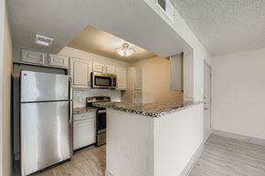 Haltom City apartment for rent - A large swimming pool in the middle of a resort-like setting.