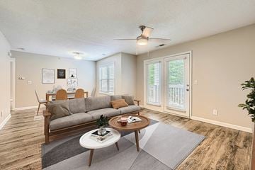 Charlotte apartment for rent - A living room with a grey sofa and a coffee table.