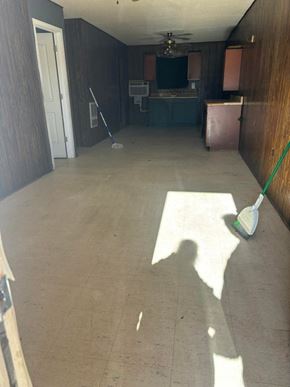 Prentiss apartment for rent - A room with a broom and a dustpan on the floor.
