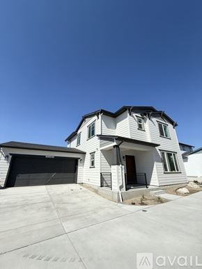 Colorado Springs house for rent - A two-story house with a garage is available for sale.