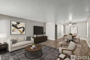 Fort Worth apartment for rent - A living room with a fireplace and a window with blinds.