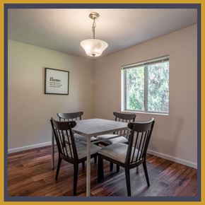 Dayton apartment for rent - A dining room with a table and chairs.