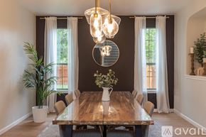 Georgetown house for rent - A dining room with a wooden table and chairs.