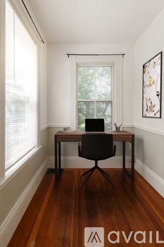 Salem condo for rent - A living room with a television and a couch.