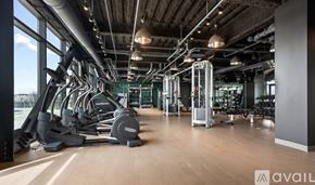 Chicago apartment for rent - A gym with treadmills, weights, and exercise machines.