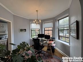 Brookline apartment for rent - A well-lit room with a desk and a chair.