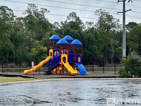 Orlando apartment for rent - A playground with a blue and yellow slide.