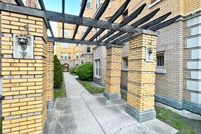 Oak Park apartment for rent - A building with a lion head decoration on the wall.