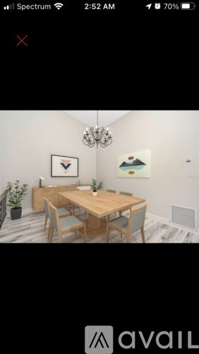 Winter Park condo for rent - A dining room with a wooden table and chairs.