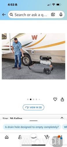 Jacksonville apartment for rent - A man is standing next to a white RV with a robotic vacuum cleaner in front of it.