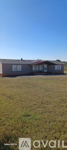 Kaufman house for rent - A house with a sign that says "available" in front of it.