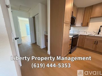 Escondido apartment for rent - A kitchen undergoing renovation with a white countertop and wooden cabinets.
