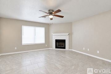 Killeen house for rent - A kitchen with white cabinets and a tiled floor.