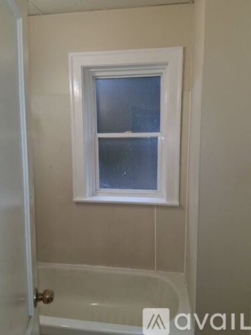 Hammond apartment for rent - A kitchen with a white stove and a sink.