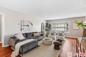 Santa Monica condo for rent - A swimming pool in a courtyard surrounded by apartment buildings.