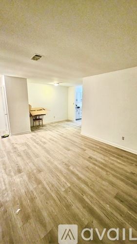 Anderson apartment for rent - A room with white walls and a door on the left.
