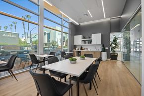 Burbank apartment for rent - A modern conference room with a long table and chairs.