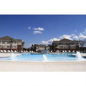 Midway Park apartment for rent - a large pool with water fountains in front of some buildings