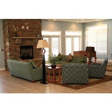 Midway Park apartment for rent - a living room with green chairs and a fireplace