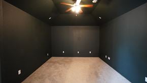 Rockwall house for rent - A room with a ceiling fan and carpeted floor.
