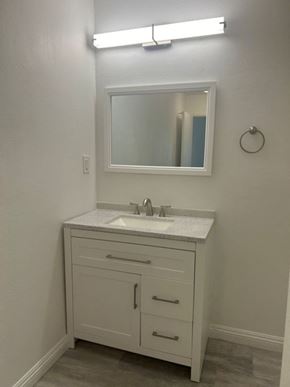 Glendale apartment for rent - A bathroom with a sink and a mirror.