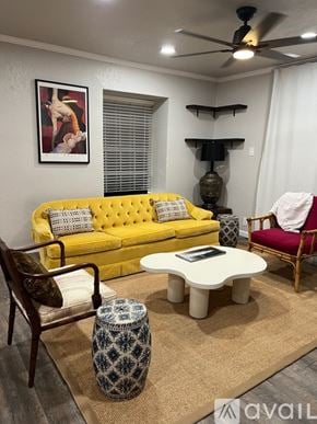 San Antonio condo for rent - A kitchen with white cabinets and a granite countertop.