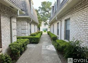 San Antonio condo for rent - A long, narrow walkway separates two rows of houses.