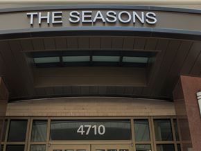Bethesda apartment for rent - a building with the seasons on top of it