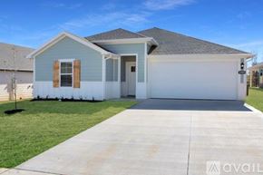 Highfill house for rent - A two-story house with a garage is available for rent.