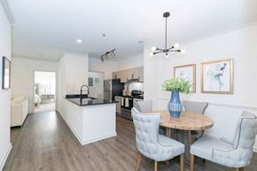 Atlanta apartment for rent - a dining room and kitchen with a table and chairs