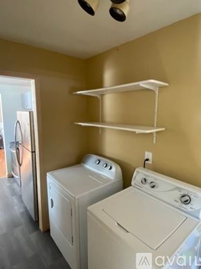 Houghton apartment for rent - A laundry room with a washer and dryer.