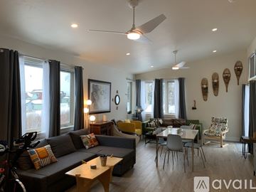 Silverthorne apartment for rent - A living room with a grey couch and a wooden coffee table.