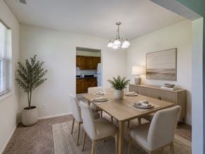 Lumberton apartment for rent - A dining room with a table set for four.