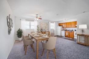 Vineland apartment for rent - a dining room with a table and chairs and a kitchen