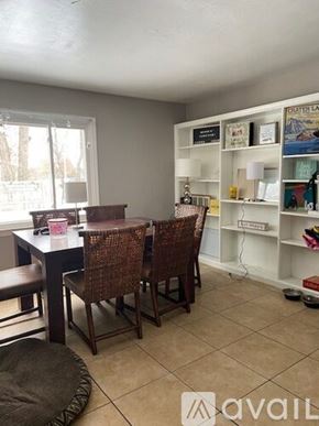 Kalamazoo house for rent - A dining room with a table and chairs.