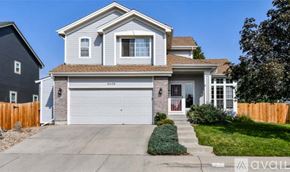 Arvada house for rent - A two-story house with a garage is for sale.