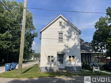 Terre Haute apartment for rent - A white house with a grey roof is for sale.