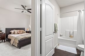 Creve Coeur apartment for rent - Master bedroom with plush carpeting and in-suite bathroom at Creve Couer apartment for rent
